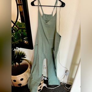 Brand new never worn size small cover alls green jumper